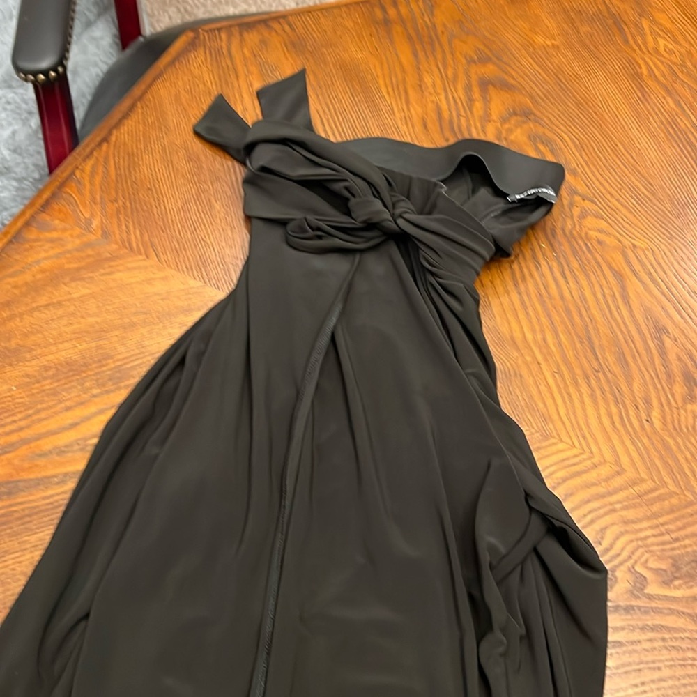 Black Wide Leg Crop pants with elastic waist band and cute tie.